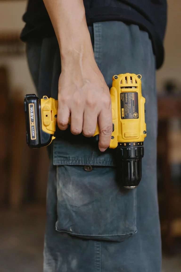 man holding drill